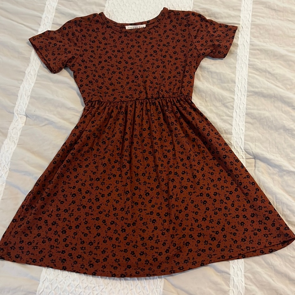 Dillards dress in size 5, cooper color with black flower detail, cotton material